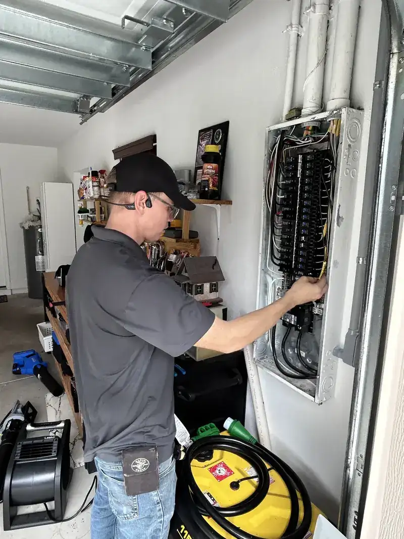 Kincaid Electric electrician working inside a home electrical panel