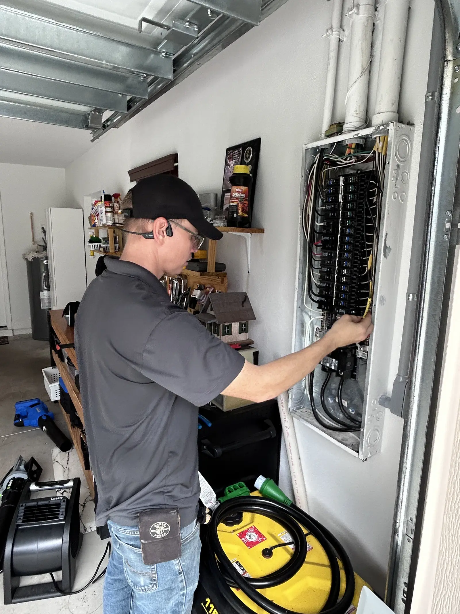 Kincaid Electric electrician working inside a home electrical panel